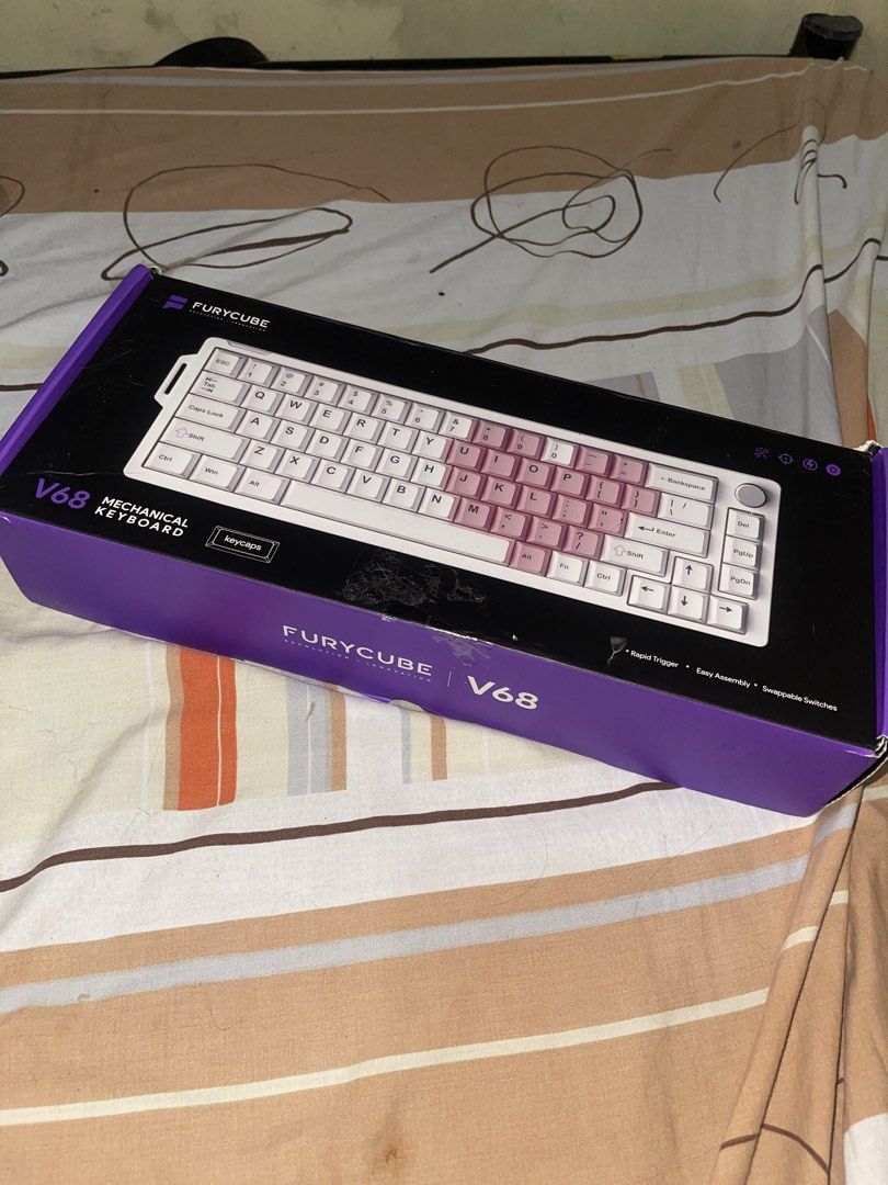 Furycube V68 Keyboard (Category: Computer Keyboard) located in Imus. Submitted by roycejoshuah (Listing ID 1462575908, Image 2). Description: Mechanical keyboard with extra keycap set, also has spiral wiring cable..