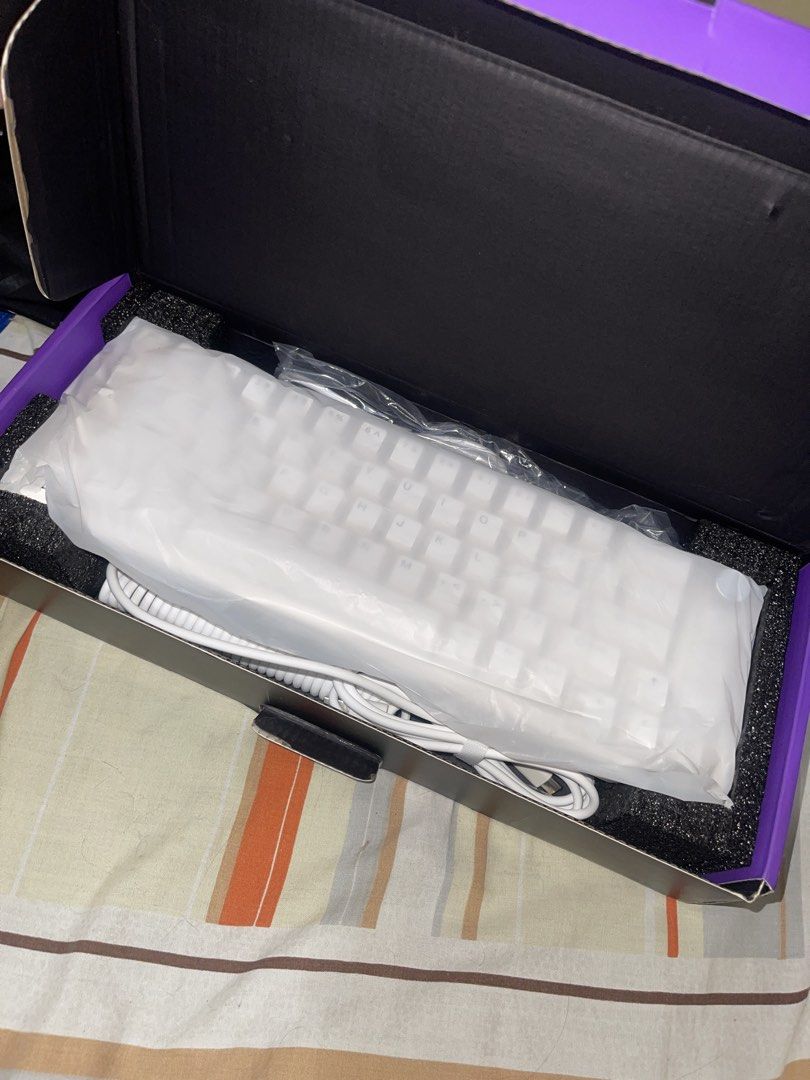 Furycube V68 Keyboard (Category: Computer Keyboard) located in Imus. Submitted by roycejoshuah (Listing ID 1462575908, Image 1). Description: Mechanical keyboard with extra keycap set, also has spiral wiring cable..