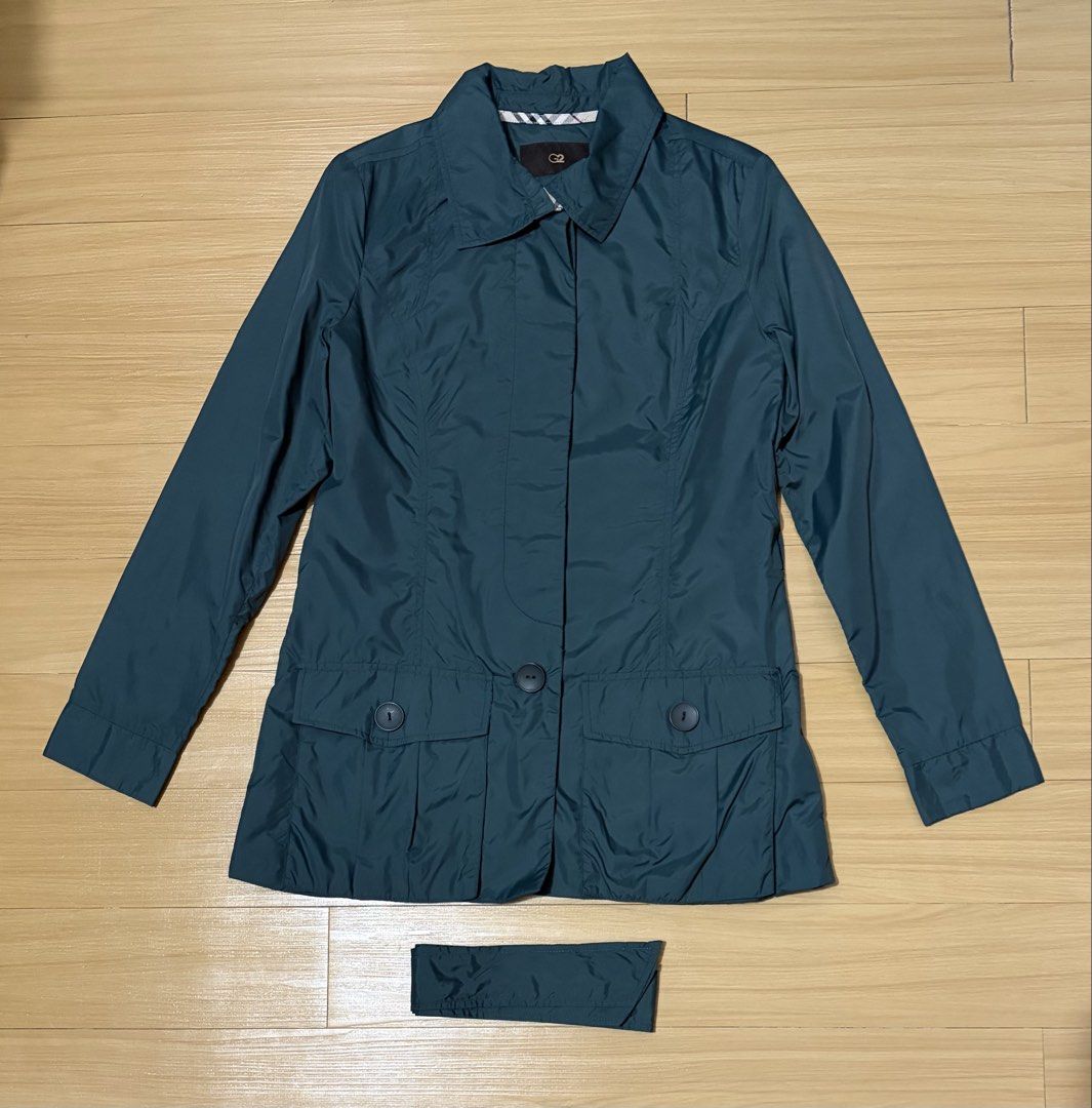 G2 Women's Green Nylon Button-Down Jacket Size 36 (Category: Coats, Jackets and Outerwear) located in Quezon City. Submitted by garagesale2026 (Listing ID 1462445093, Image 1). Description: - Used a few times - In very good condition - With detachable belt - Two front pockets; Collared neckline; Plaid pattern on inner lining - Lightweight and packable, ideal for travel or everyday wear.