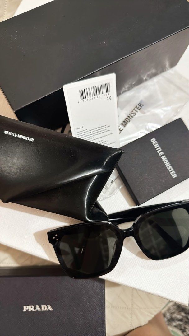 Gentle Monster HER 01 Black Sunglasses (Category: Sunglasses & Eyewear) located in San Juan City. Submitted by potchieguzman (Listing ID 1462449721, Image 1). Description: - Authentic Gentle Monster HER 01 sunglasses - Classic black acetate frames - Comes with original box, case, and tag - Excellent pre-loved condition DM me for inquiries! .