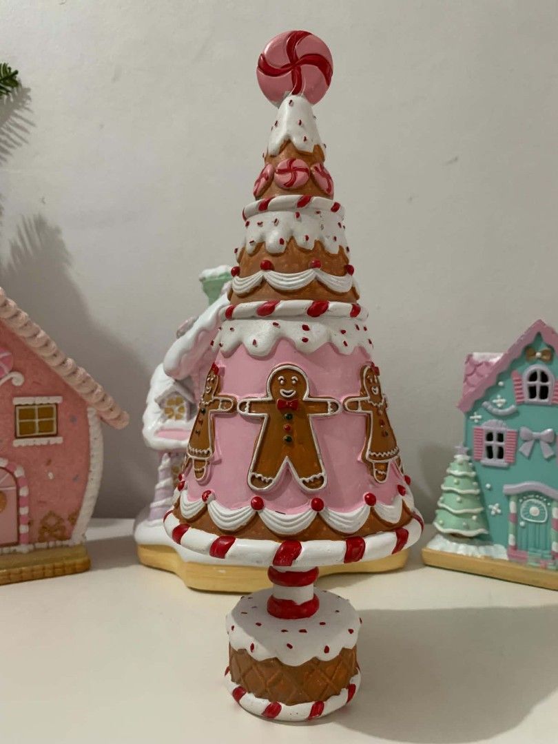 Gingerbread Tree Decor (Category: Other Home Decor) located in Quezon City. Submitted by dfabloveverything (Listing ID 1462648663, Image 1). Description: Made of Poly-resin material BNEW - No Box - Styro Bubblewrap packaging 14 inches height.