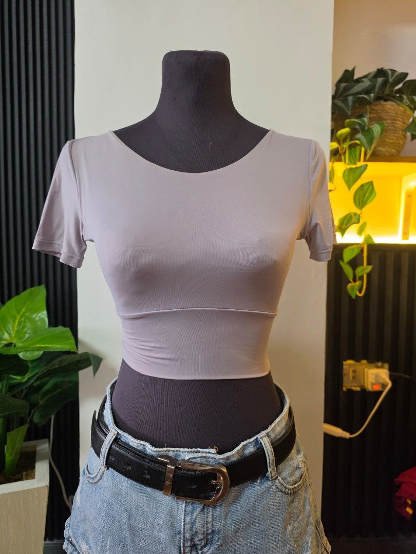 GO EXCELLENT Lattice Back Crop Top medium (Category: Sleeveless) located in Paranaque City. Submitted by franinnashop (Listing ID 1462510065, Image 1). Description: - Grey crop top - Short sleeves - Unique criss-cross lattice back design - Stretchy and comfortable material - Versatile for workouts or casual outfits - Pairs well with jeans or leggings declutter medium paranaque city.