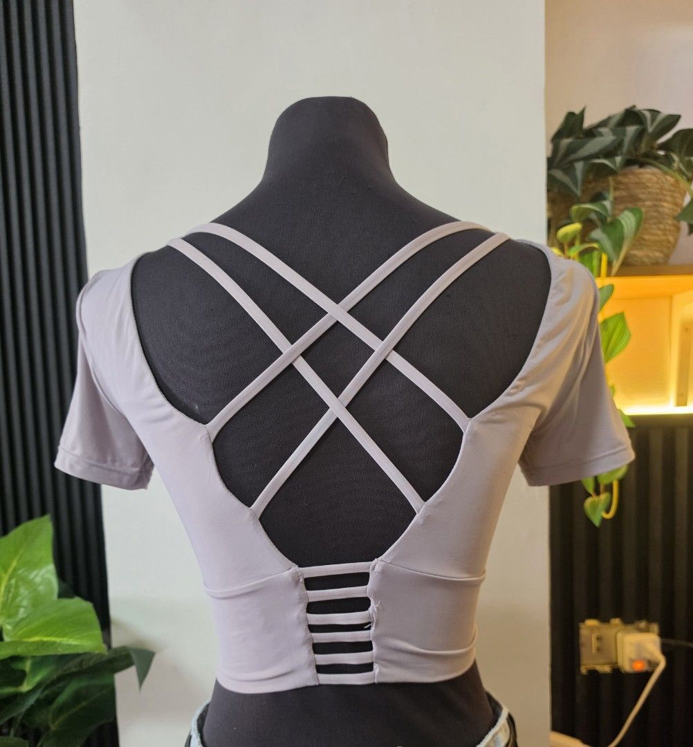 GO EXCELLENT Lattice Back Crop Top medium (Category: Sleeveless) located in Paranaque City. Submitted by franinnashop (Listing ID 1462510065, Image 3). Description: - Grey crop top - Short sleeves - Unique criss-cross lattice back design - Stretchy and comfortable material - Versatile for workouts or casual outfits - Pairs well with jeans or leggings declutter medium paranaque city.