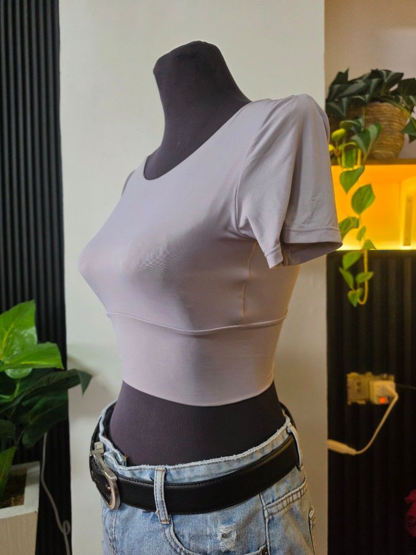 GO EXCELLENT Lattice Back Crop Top medium (Category: Sleeveless) located in Paranaque City. Submitted by franinnashop (Listing ID 1462510065, Image 2). Description: - Grey crop top - Short sleeves - Unique criss-cross lattice back design - Stretchy and comfortable material - Versatile for workouts or casual outfits - Pairs well with jeans or leggings declutter medium paranaque city.