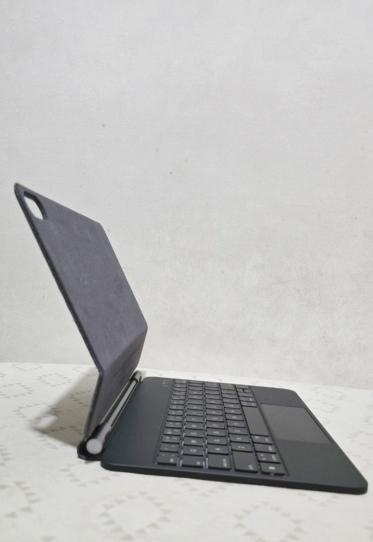 GOJODOQ Magic Keyboard (Category: Cases & Sleeves) located in Quezon City. Submitted by ashsole (Listing ID 1462546368, Image 3). Description: - Wireless Bluetooth keyboard case for tablets - Built-in trackpad for enhanced navigation - 10-meter operating distance - Long standby time: over 50 days - Convenient Type-C charging - Rechargeable 500mAh battery - Manufactured by Shenzhen Xingxing Technology Co., Ltd. - Compatible with Ipad A16 - Complet