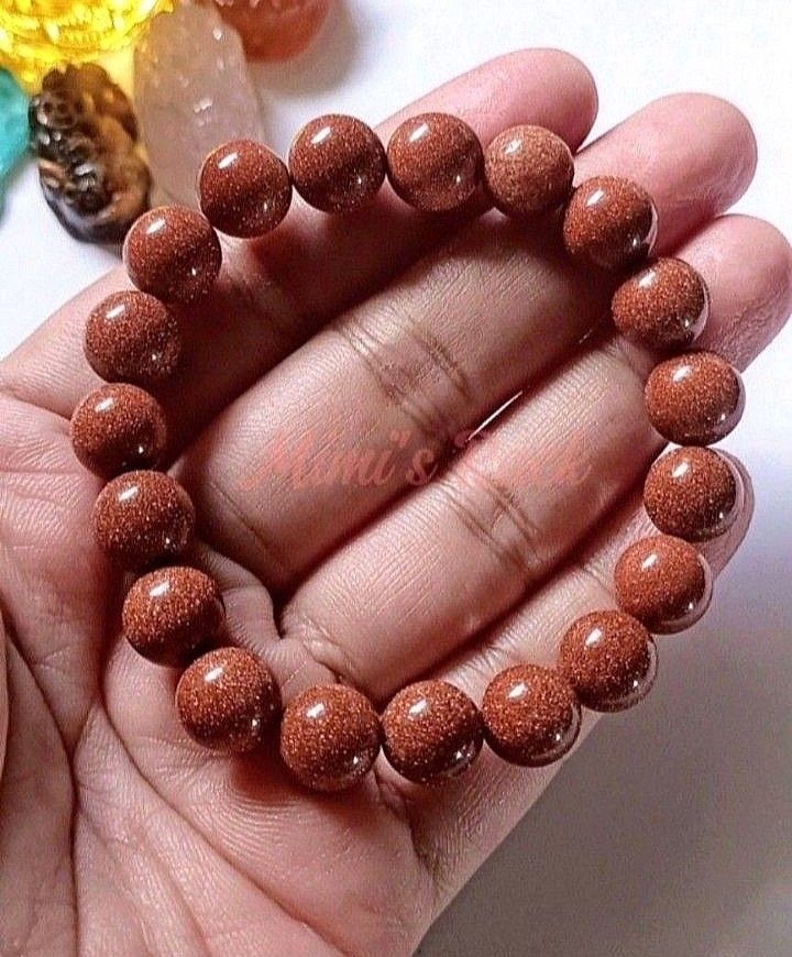 GOLDEN SANDSTONE BRACELET ROUND 10MM (Category: Bracelets) located in Taguig. Submitted by mimisrack (Listing ID 1462609799, Image 1). Description: 🧡Celestial sparkle bracelet symbolizing ambition and radiant confidence -Golden Sandstone shimmers like a starry night sky -Associated with ambition, motivation, and success energy -Golden tone symbolizes prosperity and positive opportunities -Encourages confidence and forward momentum -Fine glitter 