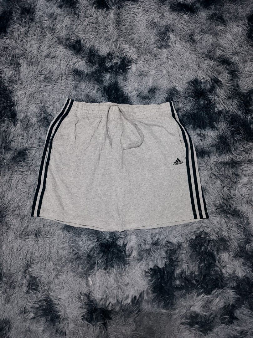 GRAY ADIDAS SHORTS (Category: Shorts) located in Taguig. Submitted by steeze_plug (Listing ID 1462488361, Image 1). Description: EXCELLENT Condition! No any issues Complete tags (authentic piece) ✅ 10/10 color rate (No fades / discolorations) ✨ Embroidered logo Solid neto! 🙌 Dimes: Free waistline size 18 length 🚛 J&T/FLASH EXPRESS delivery ➤ (Payment must be processed first) 🛵 Can also do Lalamove delivery if malapit ➤ (Can do COD, online paym