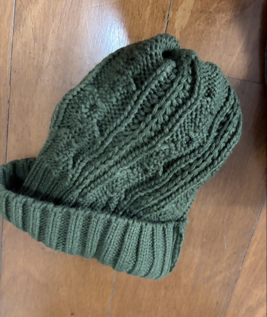 Green Cable Knit Pom Pom Beanie Hat (Category: Hats & Beanies) located in Muntinlupa City. Submitted by secondhandlove12345 (Listing ID 1462490863, Image 3). Description: - Cozy green knit beanie - Features a classic cable knit pattern - Adorned with a fluffy pom pom on top - Ribbed brim ensures a snug and comfortable fit - Ideal for keeping warm during colder weather - Simple yet stylish design For winter/autumn Negotiable Pick up by buyer .