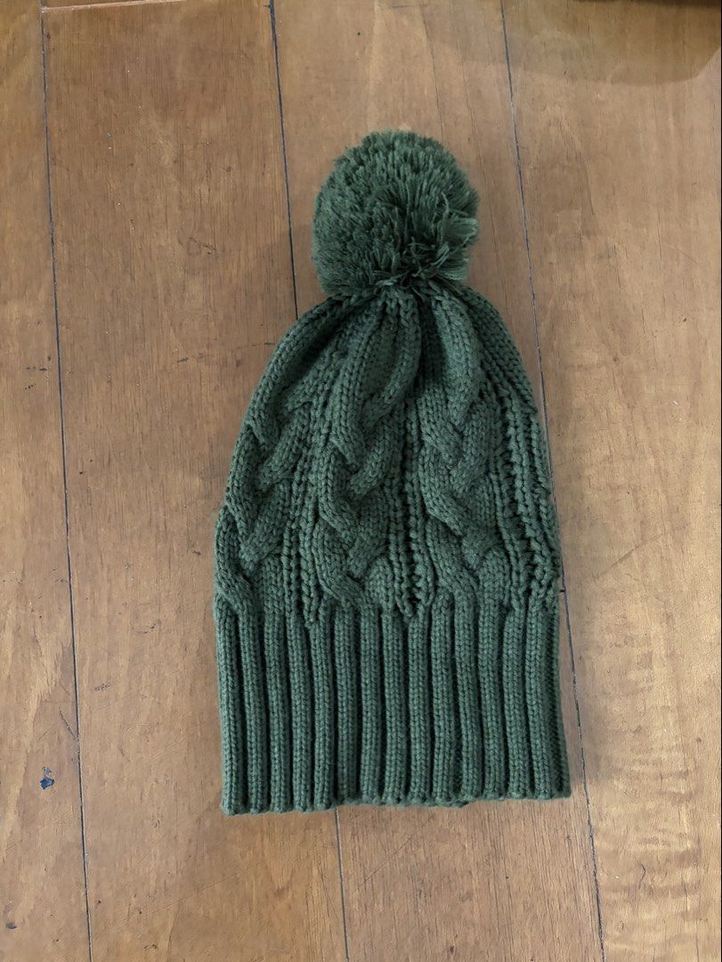 Green Cable Knit Pom Pom Beanie Hat (Category: Hats & Beanies) located in Muntinlupa City. Submitted by secondhandlove12345 (Listing ID 1462490863, Image 1). Description: - Cozy green knit beanie - Features a classic cable knit pattern - Adorned with a fluffy pom pom on top - Ribbed brim ensures a snug and comfortable fit - Ideal for keeping warm during colder weather - Simple yet stylish design For winter/autumn Negotiable Pick up by buyer .