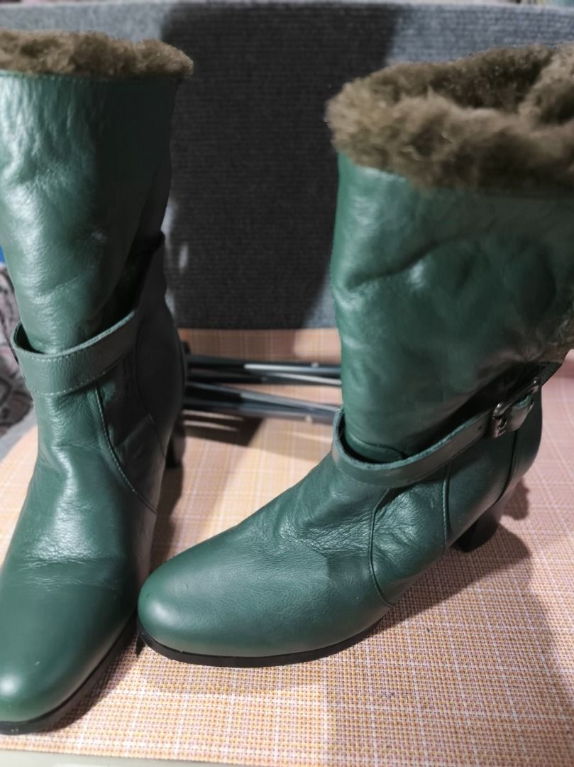 Green Leather Fur Lined Ankle Boots (Category: Boots) located in San Leonardo. Submitted by burgossanleonardo.12345 (Listing ID 1462612718, Image 3). Description: - Stylish green leather boots - Warm and cozy fur lining - Chic ankle strap with buckle detail - Comfortable block heel for all-day wear - Sole size: 22.5 - Ideal for cooler weather and adding a touch of style to your outfit.