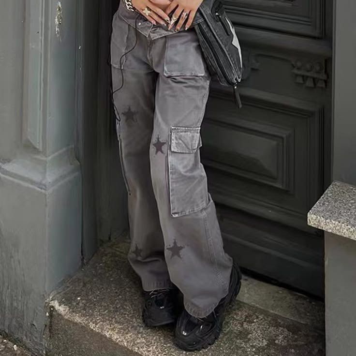 Alt grunge Emo Y2k Grey Cargo Pants with Star Print (Category: Jeans) located in Bacolod City. Submitted by stqrshel (Listing ID 1462514664, Image 1). Description: - Grey cargo pants with a unique star print. - Baggy fit for maximum comfort. - Features multiple functional pockets. - Ideal for everyday casual wear. SIZE M.