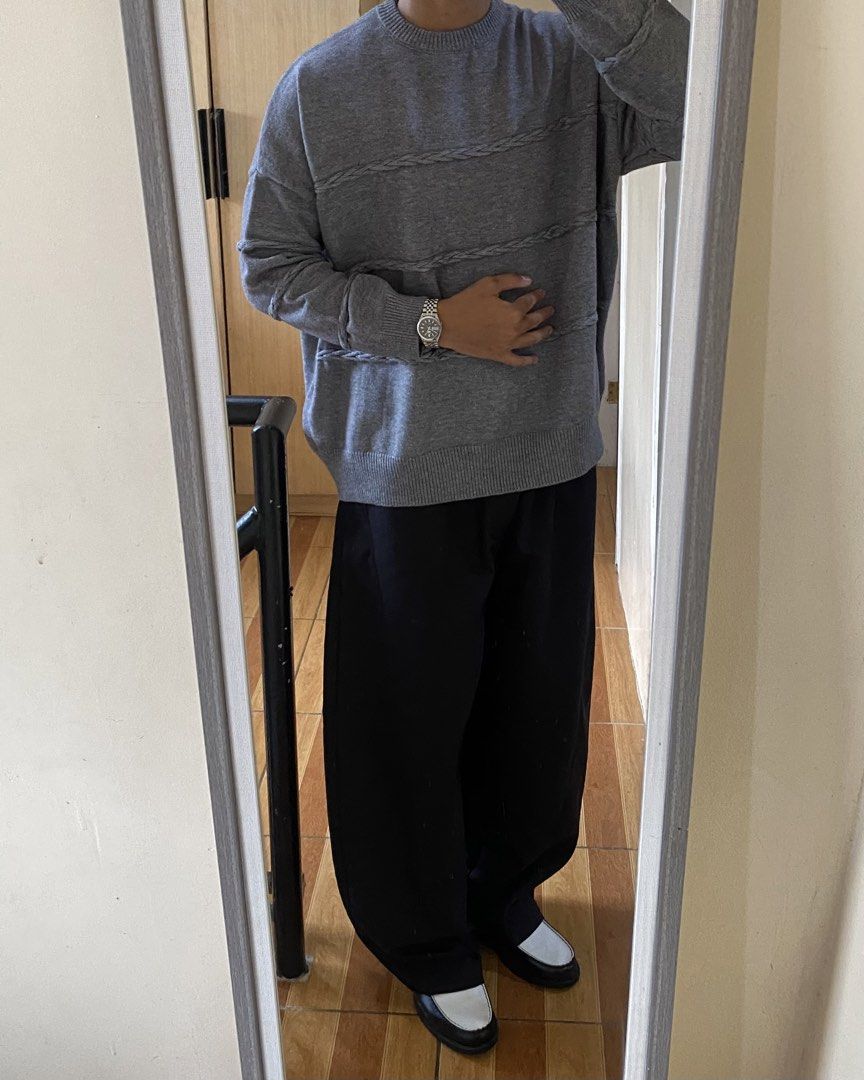 Grey Knit Sweater with Textured Stripes (Category: Coats, Jackets and Outerwear) located in Rizal. Submitted by Thethriftgood (Listing ID 1462639650, Image 3). Description: knitted cable stripped sweater dark gray Model height - 5’9 size: medium fit large (boxy cropped) dimensions: width - 26.5 length - 27 10/10 condition | issue: none Php: 1,200.