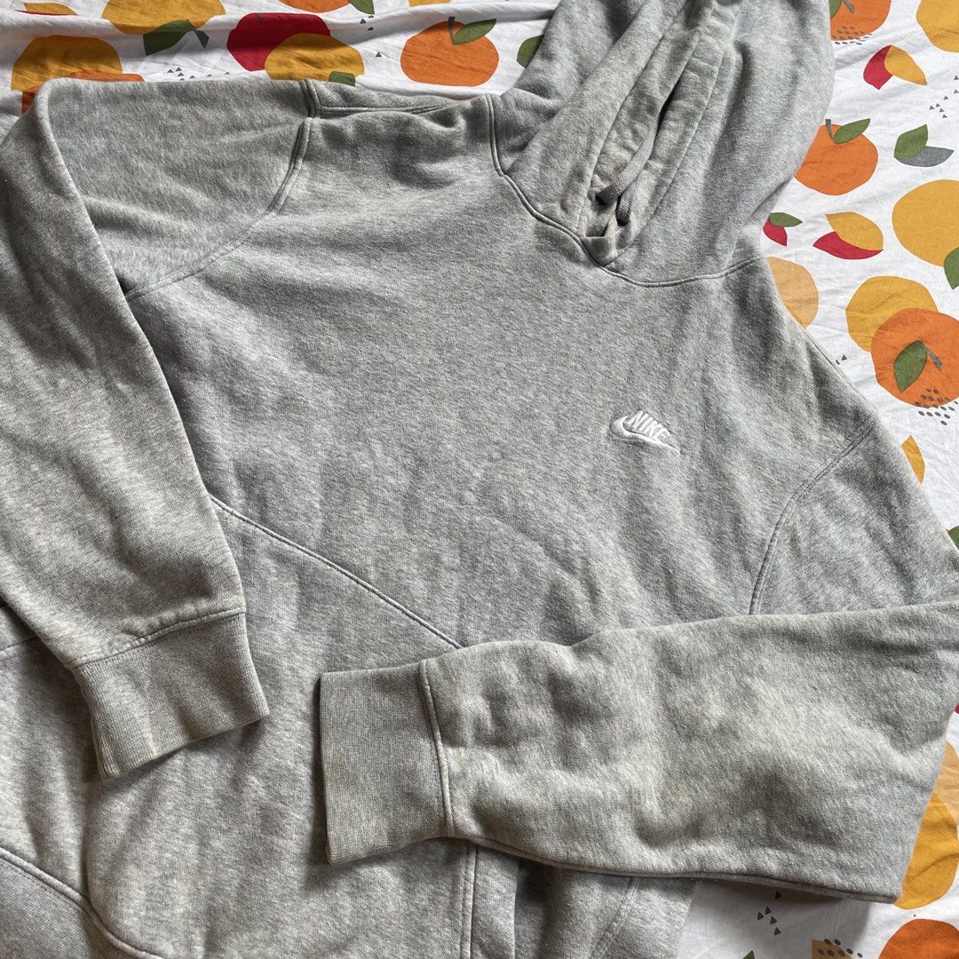 Grey Nike Hoodie (Category: Hoodies) located in Quezon City. Submitted by yeshatan (Listing ID 1462639131, Image 1). Description: - Classic grey Nike hoodie - Iconic embroidered Nike swoosh logo on chest - Comfortable and casual design - Ribbed cuffs and hem for a snug fit - Versatile for everyday wear.