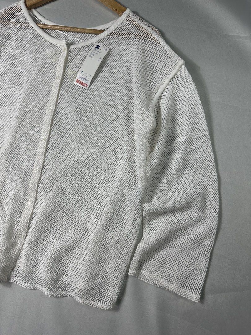 GU White Mesh 2 Way Cardigan (Category: Coats, Jackets and Outerwear) located in Cabanglasan. Submitted by thefashiongarage.co (Listing ID 1462450081, Image 3). Description: Title - GU Model/Name - Mesh 2Way Cardigan Size on Tag - Medium Conditiion - Excellent Condition with hangtag - Minimal Light Stain - Washable Dimension (WxLxH) - 21x24 Inches Category- Casual Fitting - Loose Made in - China Material - Color - White Design - Mesh Year - Inclu