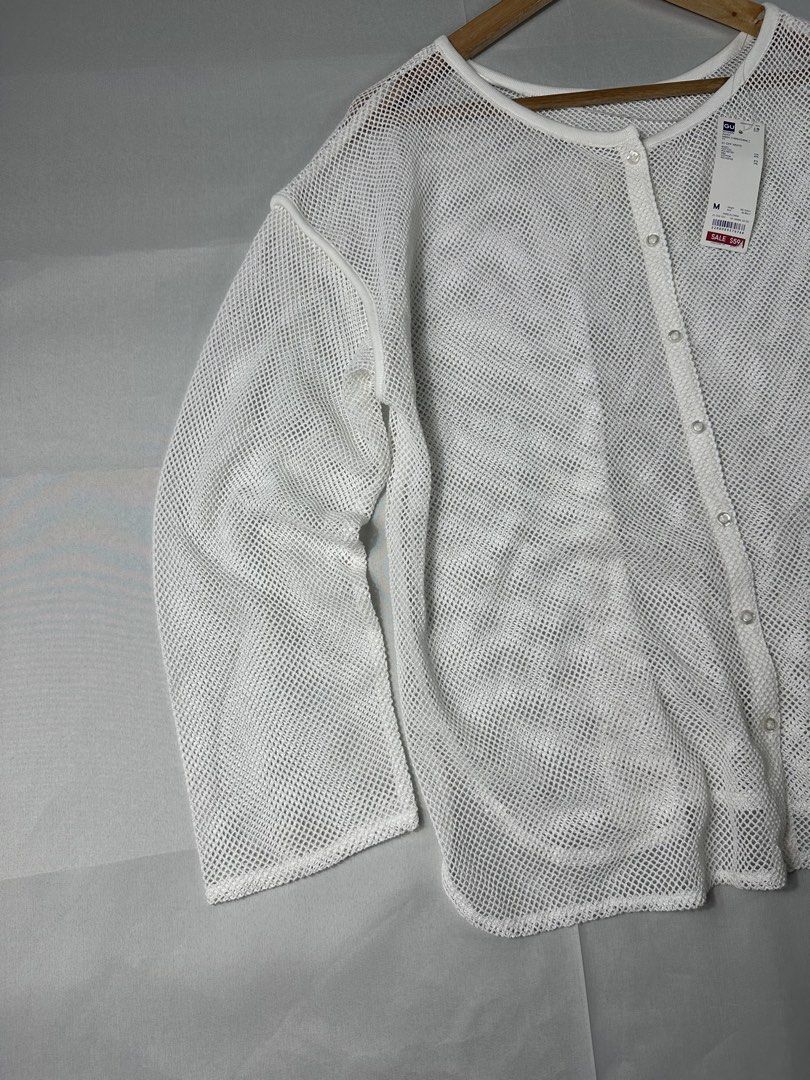 GU White Mesh 2 Way Cardigan (Category: Coats, Jackets and Outerwear) located in Cabanglasan. Submitted by thefashiongarage.co (Listing ID 1462450081, Image 2). Description: Title - GU Model/Name - Mesh 2Way Cardigan Size on Tag - Medium Conditiion - Excellent Condition with hangtag - Minimal Light Stain - Washable Dimension (WxLxH) - 21x24 Inches Category- Casual Fitting - Loose Made in - China Material - Color - White Design - Mesh Year - Inclu