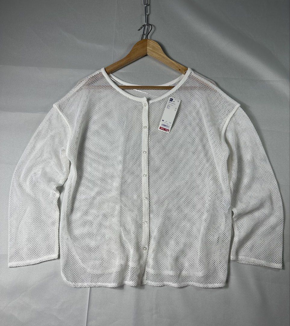 GU White Mesh 2 Way Cardigan (Category: Coats, Jackets and Outerwear) located in Cabanglasan. Submitted by thefashiongarage.co (Listing ID 1462450081, Image 1). Description: Title - GU Model/Name - Mesh 2Way Cardigan Size on Tag - Medium Conditiion - Excellent Condition with hangtag - Minimal Light Stain - Washable Dimension (WxLxH) - 21x24 Inches Category- Casual Fitting - Loose Made in - China Material - Color - White Design - Mesh Year - Inclu