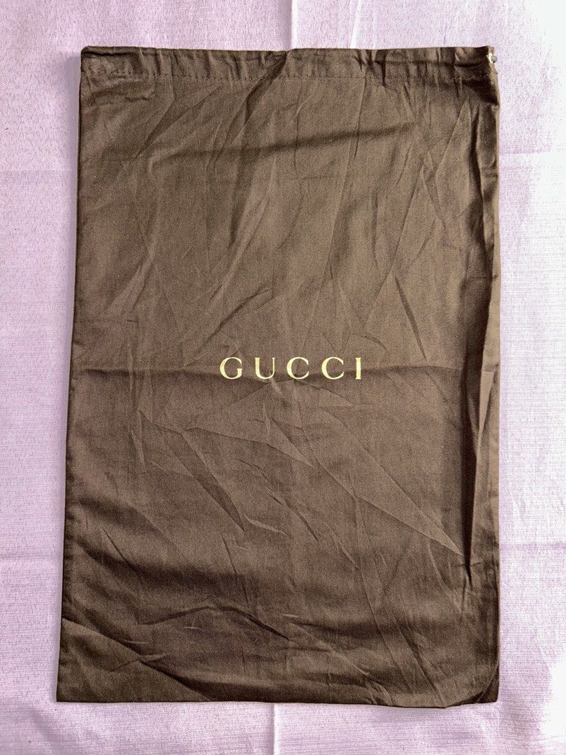 GUCCI BROWN DUST BAG (Category: Luxury Bags & Wallets) located in General Santos City (Dadiangas). Submitted by grasya_12 (Listing ID 1462495314, Image 3). Description: Details posted Minima signs of usage (need wash) .