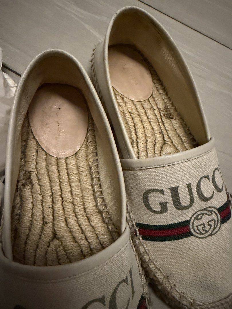 Gucci Espadrilles Canvas Flats (Category: Sneakers & Footwear) located in Taguig. Submitted by claire08hyun (Listing ID 1462558378, Image 3). Description: - Authentic Gucci espadrilles - Cream canvas with iconic GG logo - Green and red stripe detail - Rope sole with Gucci bee emblem - Made in Spain - Super comfortable and stylish.