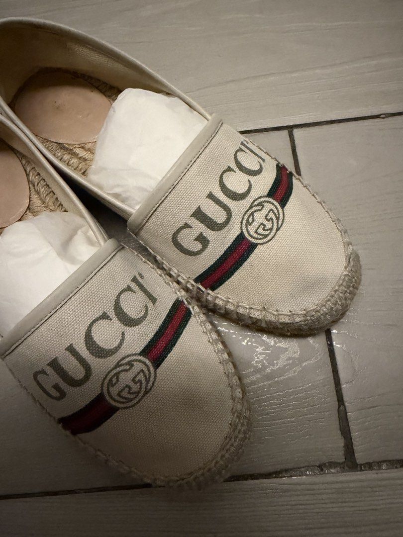 Gucci Espadrilles Canvas Flats (Category: Sneakers & Footwear) located in Taguig. Submitted by claire08hyun (Listing ID 1462558378, Image 2). Description: - Authentic Gucci espadrilles - Cream canvas with iconic GG logo - Green and red stripe detail - Rope sole with Gucci bee emblem - Made in Spain - Super comfortable and stylish.