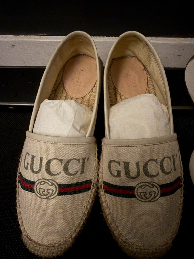 Gucci Espadrilles Canvas Flats (Category: Sneakers & Footwear) located in Taguig. Submitted by claire08hyun (Listing ID 1462558378, Image 1). Description: - Authentic Gucci espadrilles - Cream canvas with iconic GG logo - Green and red stripe detail - Rope sole with Gucci bee emblem - Made in Spain - Super comfortable and stylish.