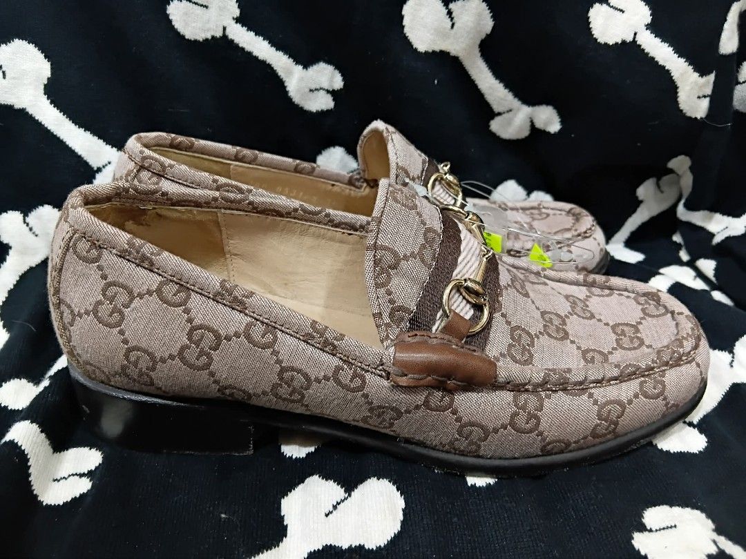 Gucci GG Canvas Loafers Size 36 (Category: Sneakers & Footwear) located in Subic. Submitted by adamdwyane (Listing ID 1462476722, Image 1). Description: - Authentic Gucci Loafers - Classic GG Canvas (Brown/Beige Monogram) - Signature Horsebit Detail - Made in Italy - Size: 36 - Condition: Soles show wear, interior is clean - A stylish pair of designer footwear.