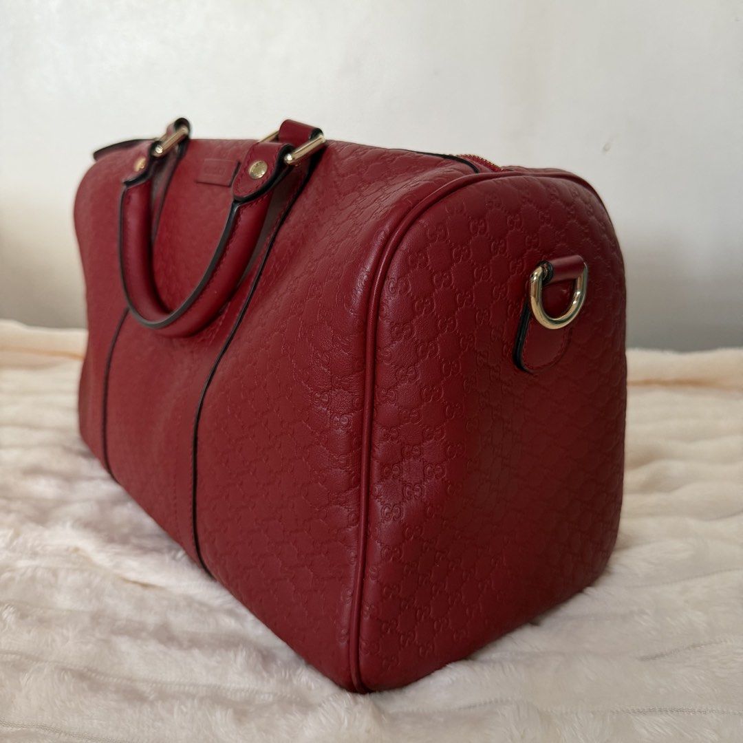 GUCCI Microguccisima Boston Bag (Category: Luxury Bags & Wallets) located in Santa Cruz. Submitted by vendrenee (Listing ID 1462558628, Image 2). Description: ✨GUCCI✨ Medium Microguccissima Boston Bag ♥️RED ❀embossed leather body ❀rolled leather handles ❀detachable flat leather strap ❀top zip closure ❀interior zip and slip pockets ❀Serial Number: 449646 493075 INCLUSIONS: 👜 Storage bag 📜 Entrupy Certificate of Authenticity ♥️Bag organizer ✘No G