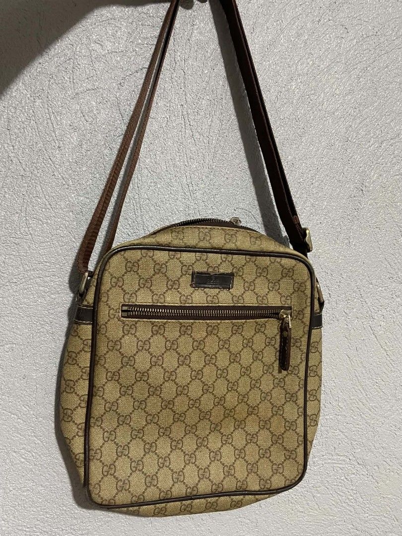 Gucci Monogram Crossbody Bag (Category: Luxury Bags & Wallets) located in Manila. Submitted by buyingprelovedukayukay (Listing ID 1462616655, Image 1). Description: - Classic Gucci monogram crossbody bag - Brown and beige GG pattern - Genuine leather trim and strap - Top zipper closure - Front zipper pocket - Perfect for everyday use.