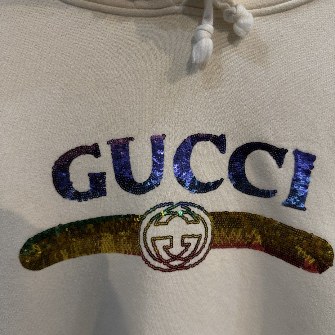 Gucci Sequin Cream Hoodie (Category: Hoodies) located in Manila. Submitted by jerichomal82553 (Listing ID 1462647724, Image 2). Description: Gucci Sequin Cream Hoodie 25 by 25 Good Condition Complete Tags Need Wash CLAIM 2K.