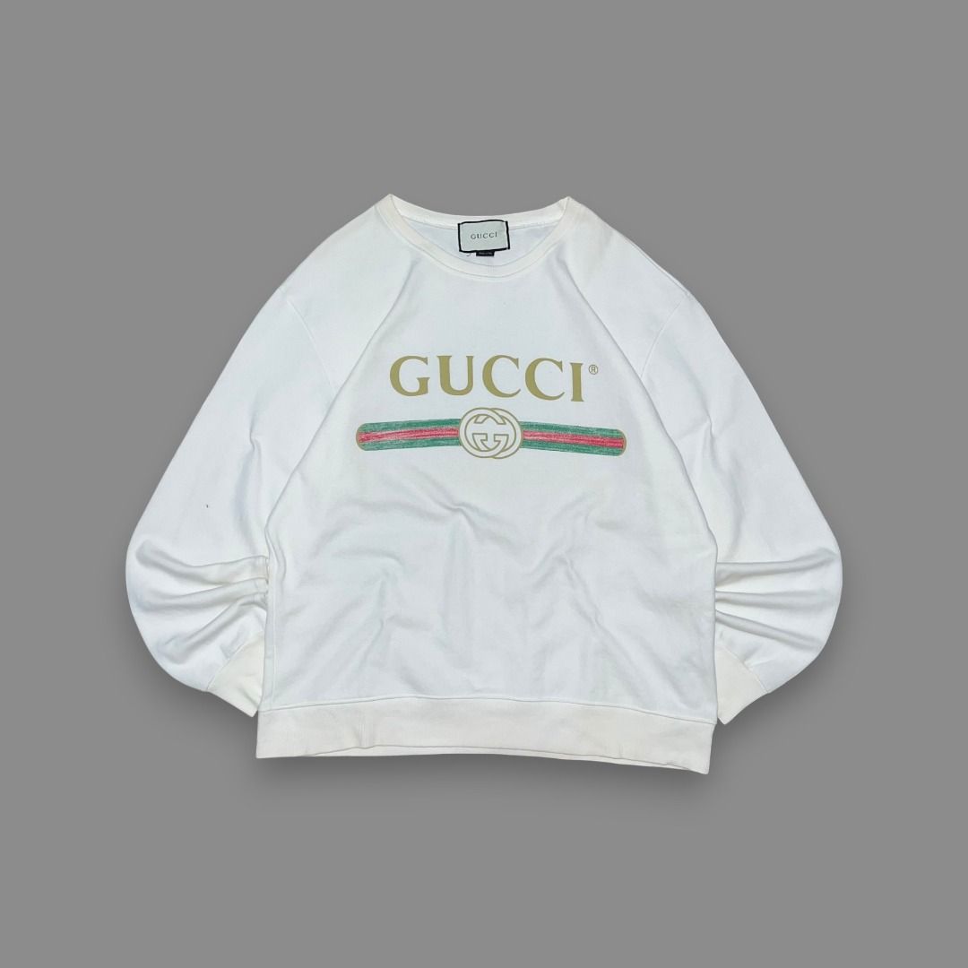 GUCCI SPELLOUT WHITE SWEATSHIRT (Category: Coats, Jackets and Outerwear) located in Quezon. Submitted by ejay.thrift.clothes (Listing ID 1462535544, Image 1). Description: FREE SHIPPING XL 22.5 X 27 NO ISSUE COLOR RATE: 9/10 EXCELLENT CONDITION # 326.