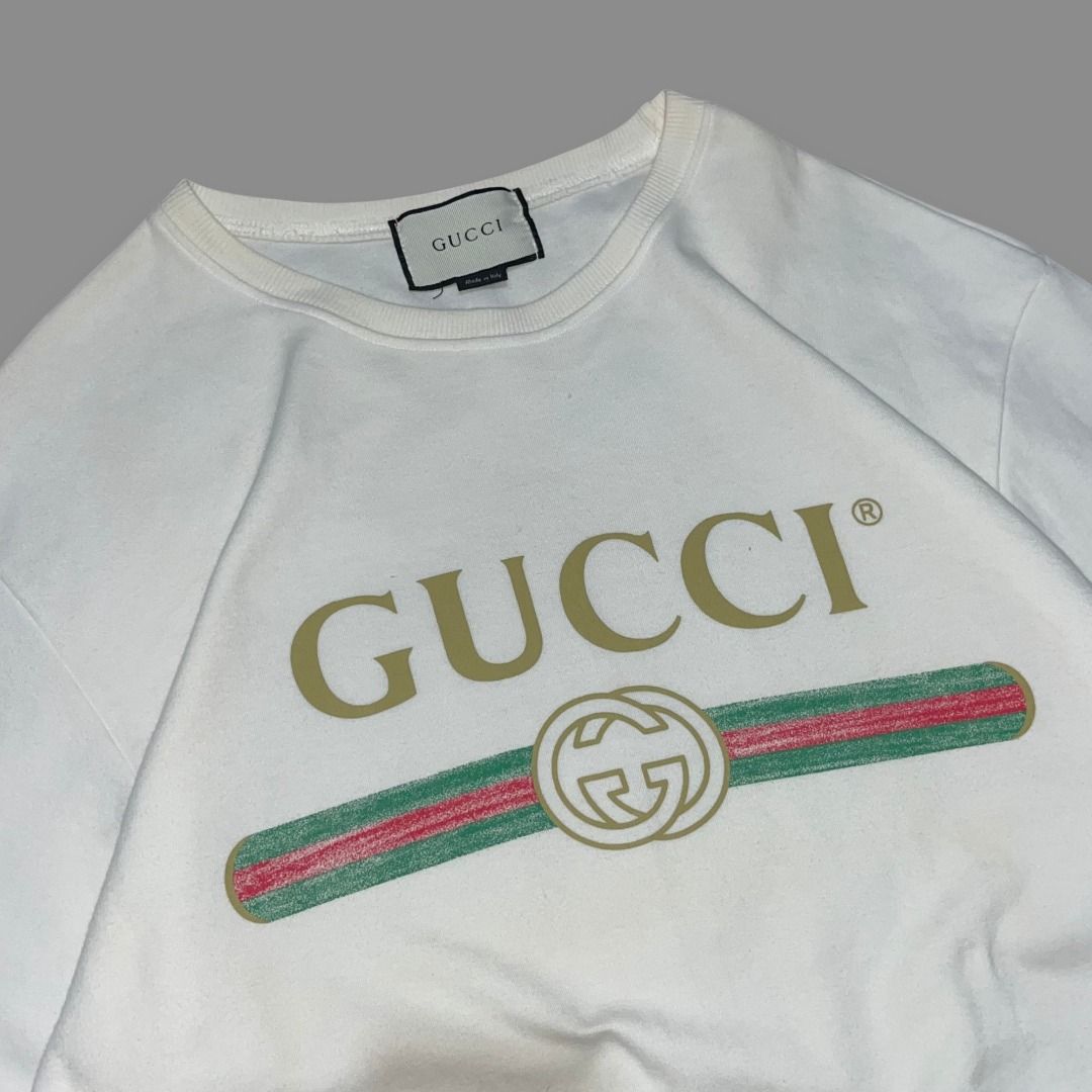 GUCCI SPELLOUT WHITE SWEATSHIRT (Category: Coats, Jackets and Outerwear) located in Quezon. Submitted by ejay.thrift.clothes (Listing ID 1462535544, Image 2). Description: FREE SHIPPING XL 22.5 X 27 NO ISSUE COLOR RATE: 9/10 EXCELLENT CONDITION # 326.
