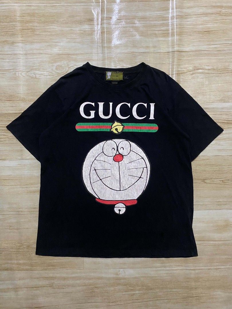 Gucci x Doraemon tshirt (Category: Tshirts & Polo Shirts ) located in Manila. Submitted by jihan.nunez_8 (Listing ID 1462673501, Image 1). Description: W22 L27 hairline.