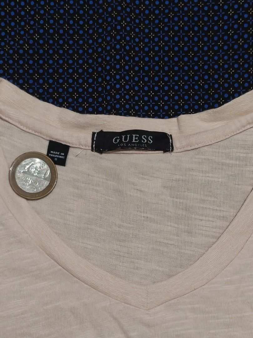 Guess Los Angeles Pink (Category: Shirts) located in Tagbilaran City. Submitted by freikfinds (Listing ID 1462493813, Image 3). Description: - Pink Guess t-shirt - V-neck style - Embroidered Guess Los Angeles logo on chest - Made in the Philippines - Slightly textured fabric for a unique look - Ideal basic tee for daily outfits - Easily pairs with jeans or shorts -Butuan City, Mindanao .