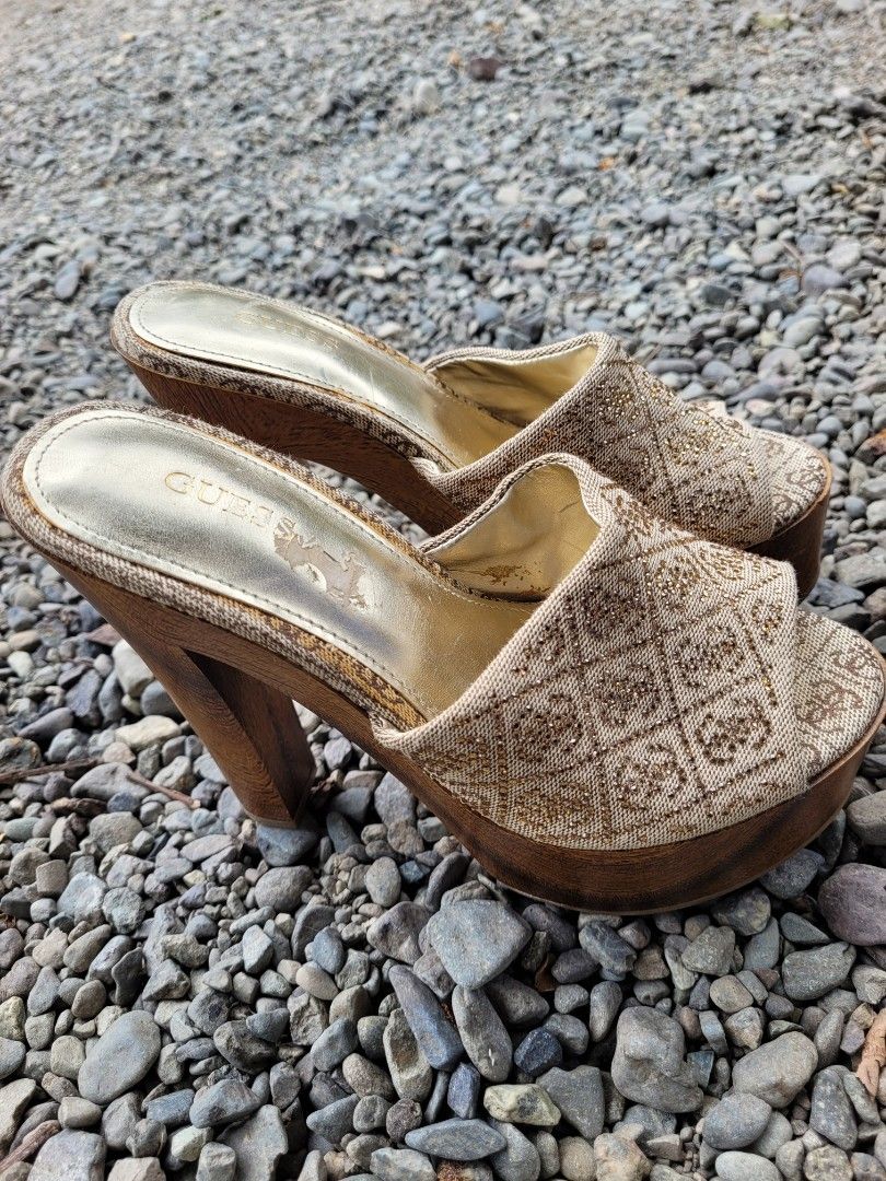 Guess Platform Wedge Heels (Category: Heels) located in Manila. Submitted by mrs.jane08 (Listing ID 1462491042, Image 3). Description: - Guess platform wedge heels - Tan and gold patterned fabric upper - Wooden-look wedge heel and platform - Slip-on style - Super cute and unique design - Great for dressing up an outfit.