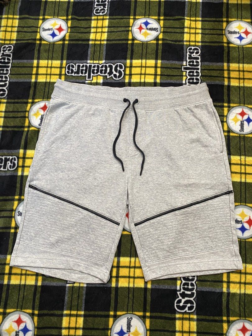 Guess, Sweat shorts (Category: Shorts) located in Cavite. Submitted by jc_thrift95 (Listing ID 1462580014, Image 1). Description: - light grey Guess sweat shorts featuring a small triangular logo patch near the rear pocket. - Stretch,Garterized. - Two side pockets, one at the back (right). - No issue, need wash - Made in Vietnam - Color rate 9/10 - See details picture for dimes..