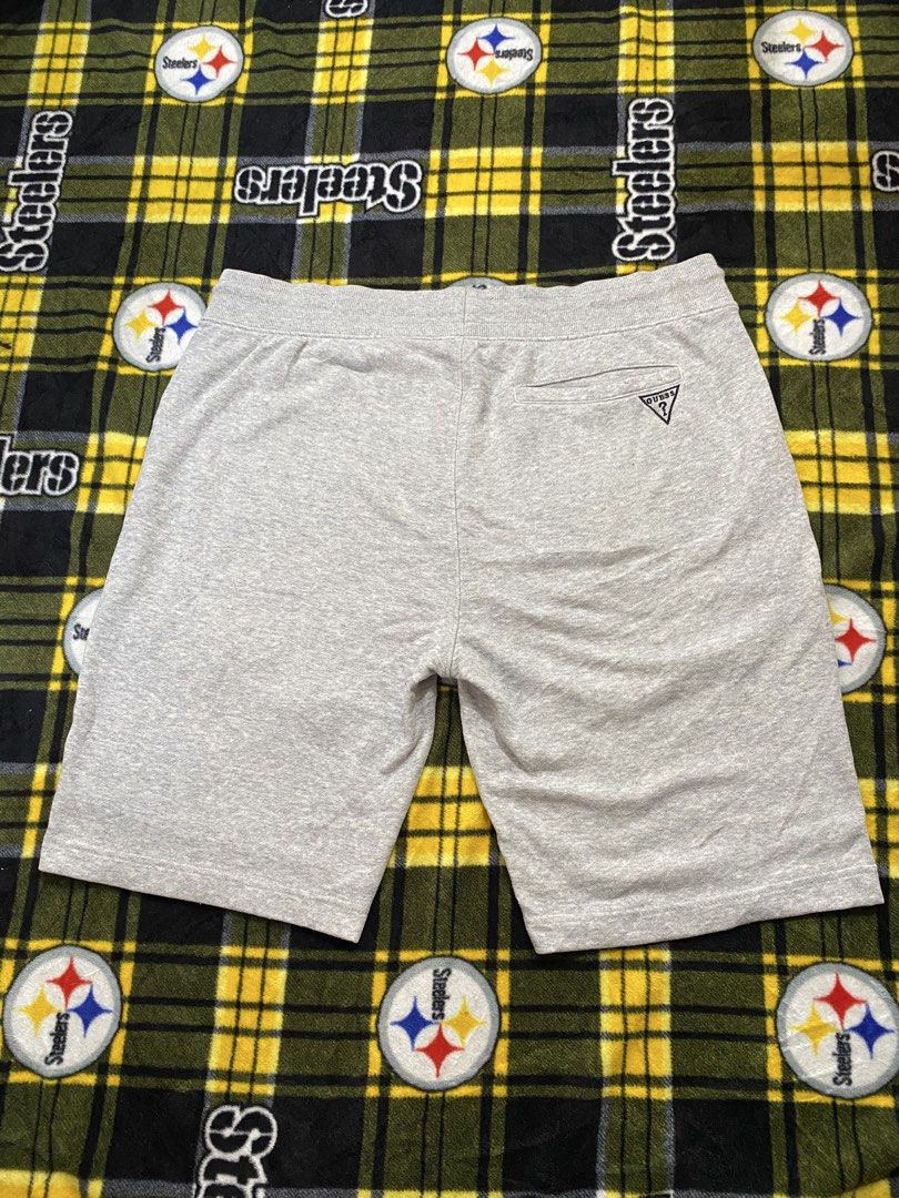 Guess, Sweat shorts (Category: Shorts) located in Cavite. Submitted by jc_thrift95 (Listing ID 1462580014, Image 2). Description: - light grey Guess sweat shorts featuring a small triangular logo patch near the rear pocket. - Stretch,Garterized. - Two side pockets, one at the back (right). - No issue, need wash - Made in Vietnam - Color rate 9/10 - See details picture for dimes..
