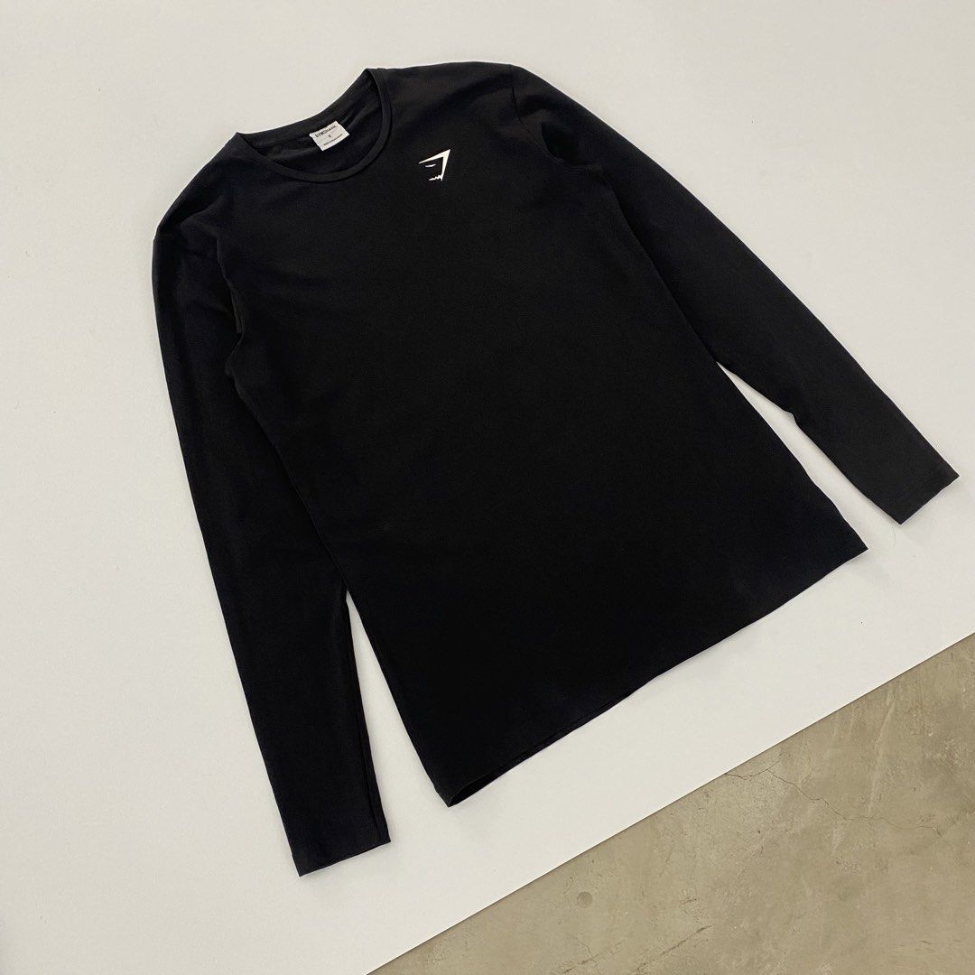 Gymshark Black Long Sleeve Training Shirt Size S (Category: Activewear) located in Manila. Submitted by eddjohn (Listing ID 1462564021, Image 2). Description: - Gymshark Black Long Sleeve Training Shirt - Size: S - Color: Black - Material: Comfortable fabric - Features: Gymshark logo on chest - Origin: Made in Bangladesh - Ideal for: Workouts and casual wear - Condition: Please check photos for details - medium fit mens.