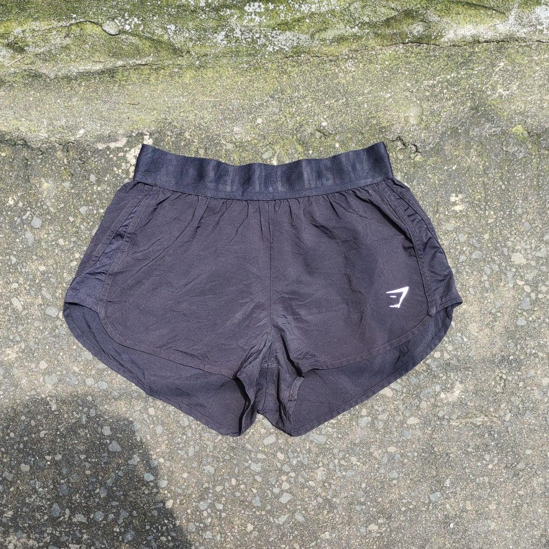 GymShark Training Loose Fit Shorts (Category: Shorts) located in Manila. Submitted by cyprus.thrift (Listing ID 1462540806, Image 1). Description: GymShark Shorts good condition need wash +sf dimes: waist 28 length 13 hem 12.5 rise 10.5 issue: loose stitch but already repaired.