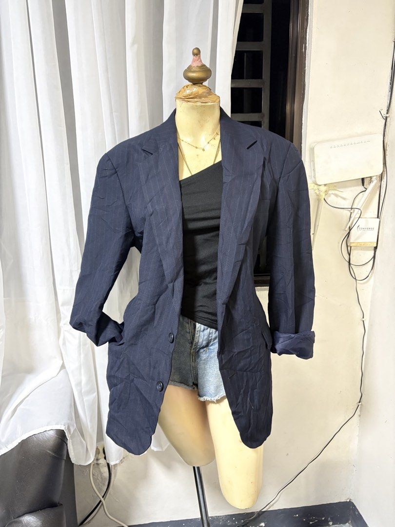 Haggar Navy Pinstripe Blazer (Category: Coats, Jackets and Outerwear) located in General Trias. Submitted by crissy9053136 (Listing ID 1462612040, Image 1). Description: - Classic navy blazer from Haggar - Features subtle pinstripes - Two-button closure - Versatile for smart casual, work, or evening wear.