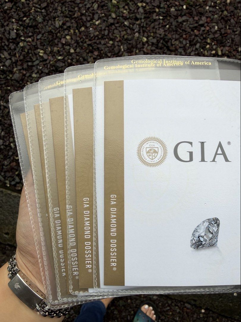 Half Eternity Heart Diamond Ring with GIA Certificates (Category: Rings) located in Valenzuela. Submitted by calmpenguin_f100f2 (Listing ID 1462559176, Image 3). Description: Setting: Solid 18K White Gold Ring Size: 6.5 Stone Configuration: 5 Multi-Carat Heart Cut Diamonds Carat Weight: 0.30 carats per stone (1.50 Total Carat Weight) Diamond Color: F (Colorless and Exceptionally Bright) Diamond Clarity: VVS2 (Very, Very Slightly Included — Comple