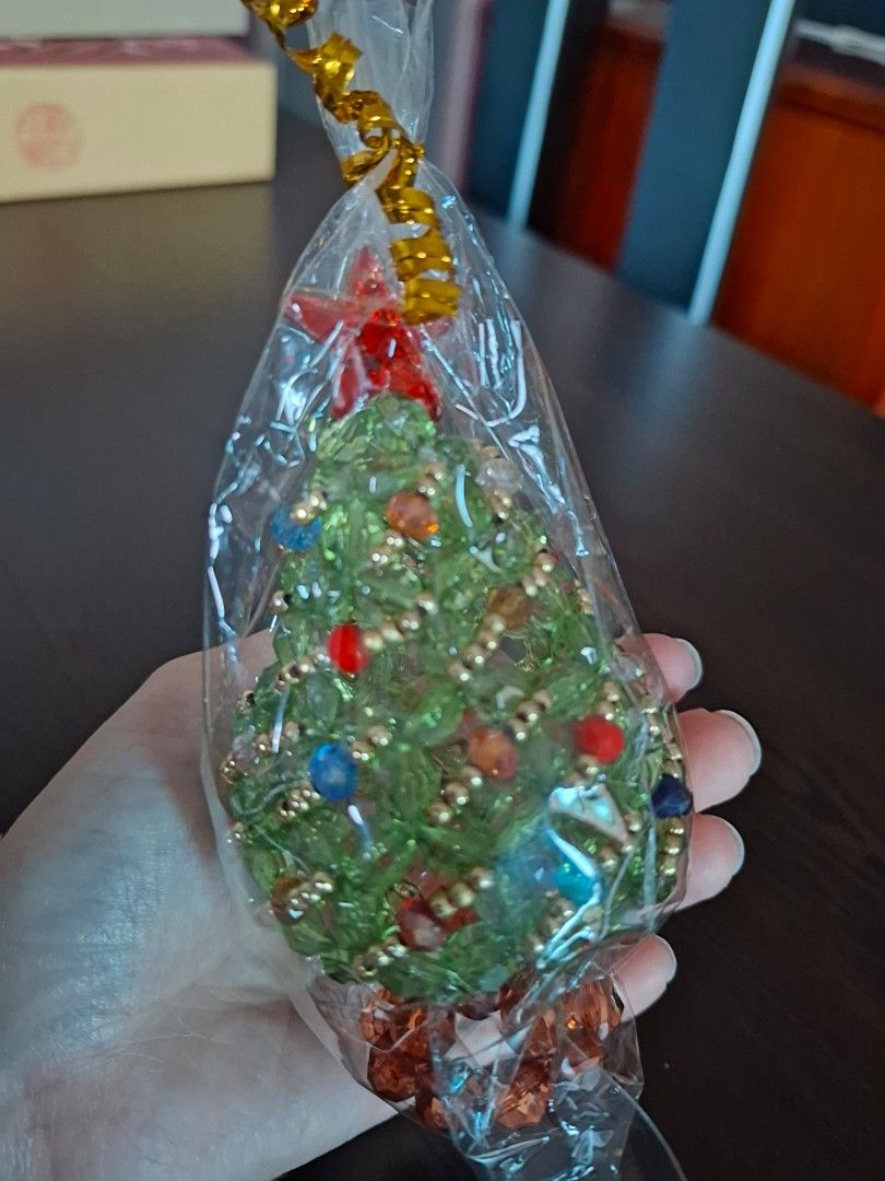Handmade beaded christmas tree (Category: Other Home Decor) located in Pasig City. Submitted by keekeedee (Listing ID 1462557896, Image 3). Description: price each handmade brand new sealed pwede pang gift the size reference is shown sa pics and the bead may vary teknikolor sya size ng kabute so cute pan display sa mesa.