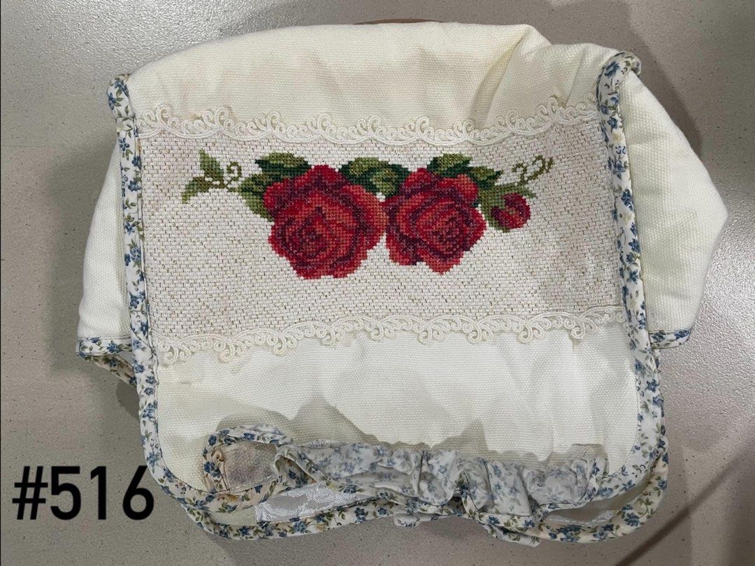 Handmade Embroidered Rose Tissue Box Cover (Category: Storage Boxes & Baskets) located in Quezon City. Submitted by meggoquingco (Listing ID 1462558225, Image 2). Description: - Cute tissue box cover with beautiful red rose embroidery - Features delicate lace trim - Floral fabric lining - Fits standard tissue boxes - Adds a lovely decorative touch to bedrooms or living areas - Handmade with care.