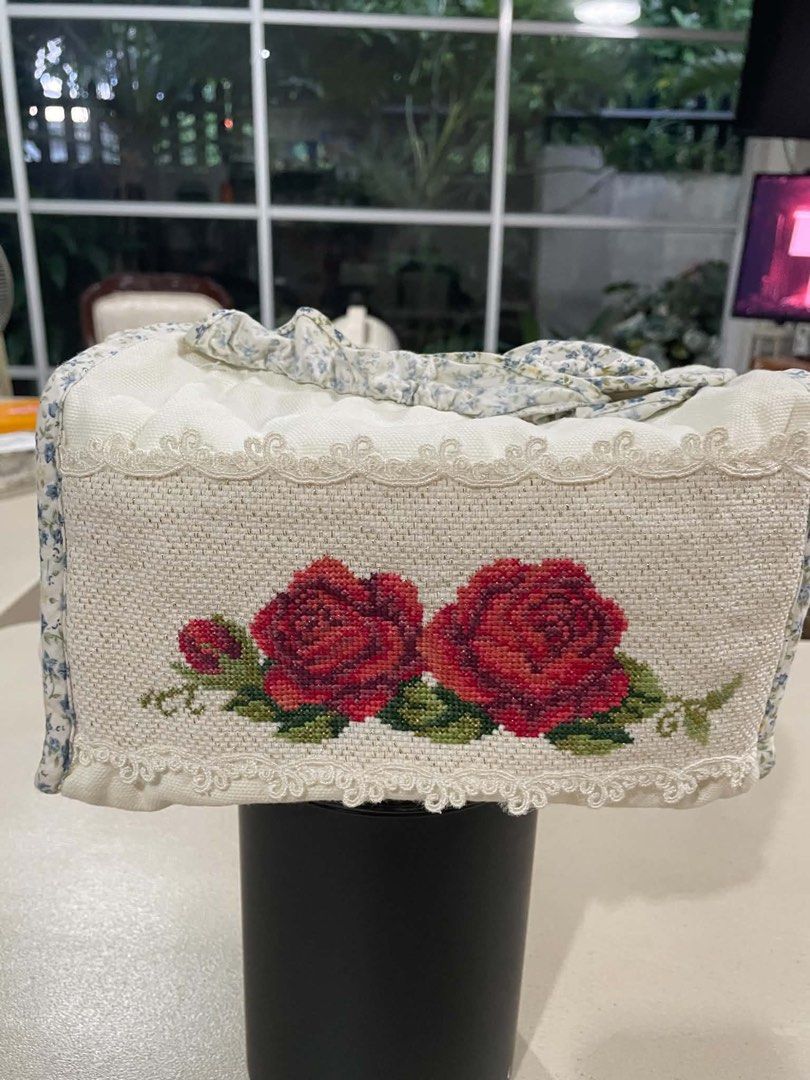 Handmade Embroidered Rose Tissue Box Cover (Category: Storage Boxes & Baskets) located in Quezon City. Submitted by meggoquingco (Listing ID 1462558225, Image 1). Description: - Cute tissue box cover with beautiful red rose embroidery - Features delicate lace trim - Floral fabric lining - Fits standard tissue boxes - Adds a lovely decorative touch to bedrooms or living areas - Handmade with care.
