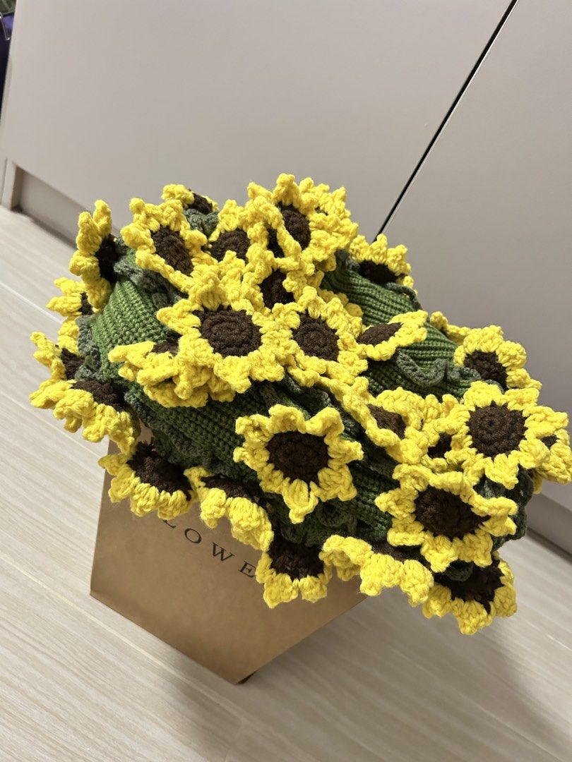 Handmade Knitted Sunflower Blanket Throw (Category: Bedding & Towels) located in Navotas City. Submitted by rivera_ysalouis (Listing ID 1462453489, Image 1). Description: - Adorable handmade knitted blanket - Vibrant green with cheerful yellow sunflowers around the edge - Super cozy and soft texture - Perfect for adding a pop of color and warmth to your couch or bed - Ideal for snuggling up on chilly days.