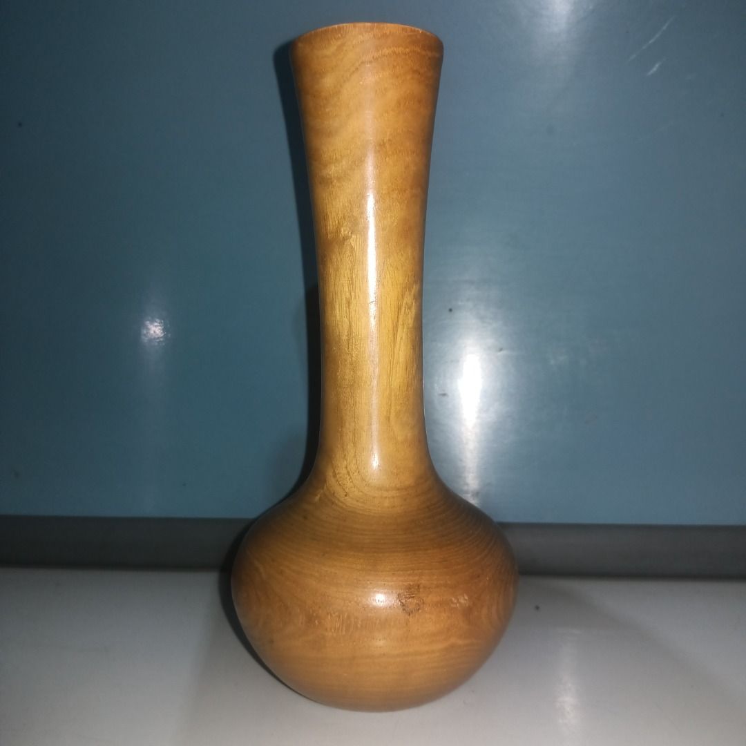 Handmade Wooden Vase with Maker's Mark (Category: Vases & Decorative Bowls) located in Munoz. Submitted by larryc1212 (Listing ID 1462489762, Image 2). Description: - Small, handcrafted wooden vase - Features beautiful, natural wood grain - Maker's mark stamped on the bottom - Perfect for displaying a single stem - Also great as a standalone decorative piece - Approximately 6.25 inches tall - Truly unique item Disclaimer: Item may include some sc
