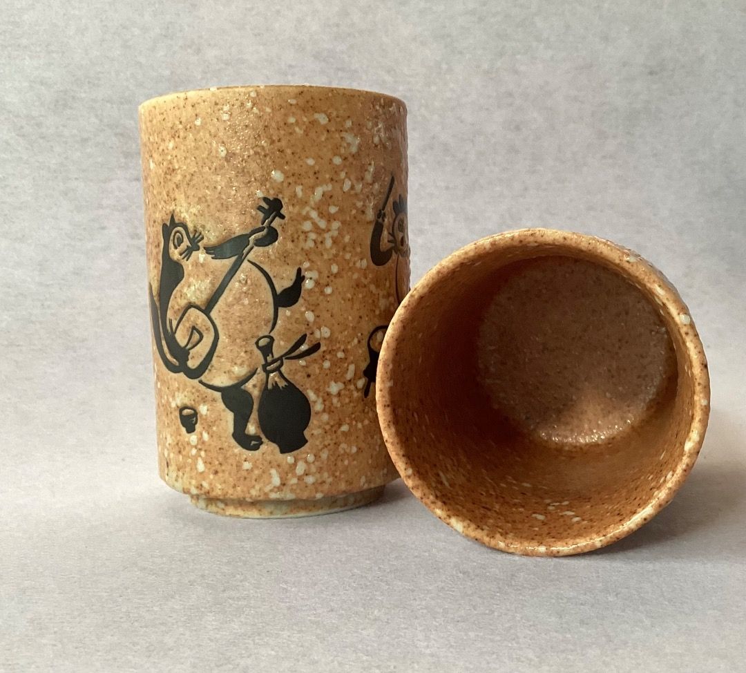“Harmony & Gratitude" Tanuki Tea Cup Pair (Category: Coffee & Tea Tableware) located in Davao. Submitted by eclectic1925 (Listing ID 1462602381, Image 3). Description: Php120 for 2 “Harmony & Gratitude" Tanuki Tea Cup Pair H: 3.5 inches L: 2.3 inches Capacity: 150 ml *English Translation: "It is a beautiful thing to get along well with others" or "How wonderful and beautiful it is when people live in harmony/friendship. *English Translation: "Gra