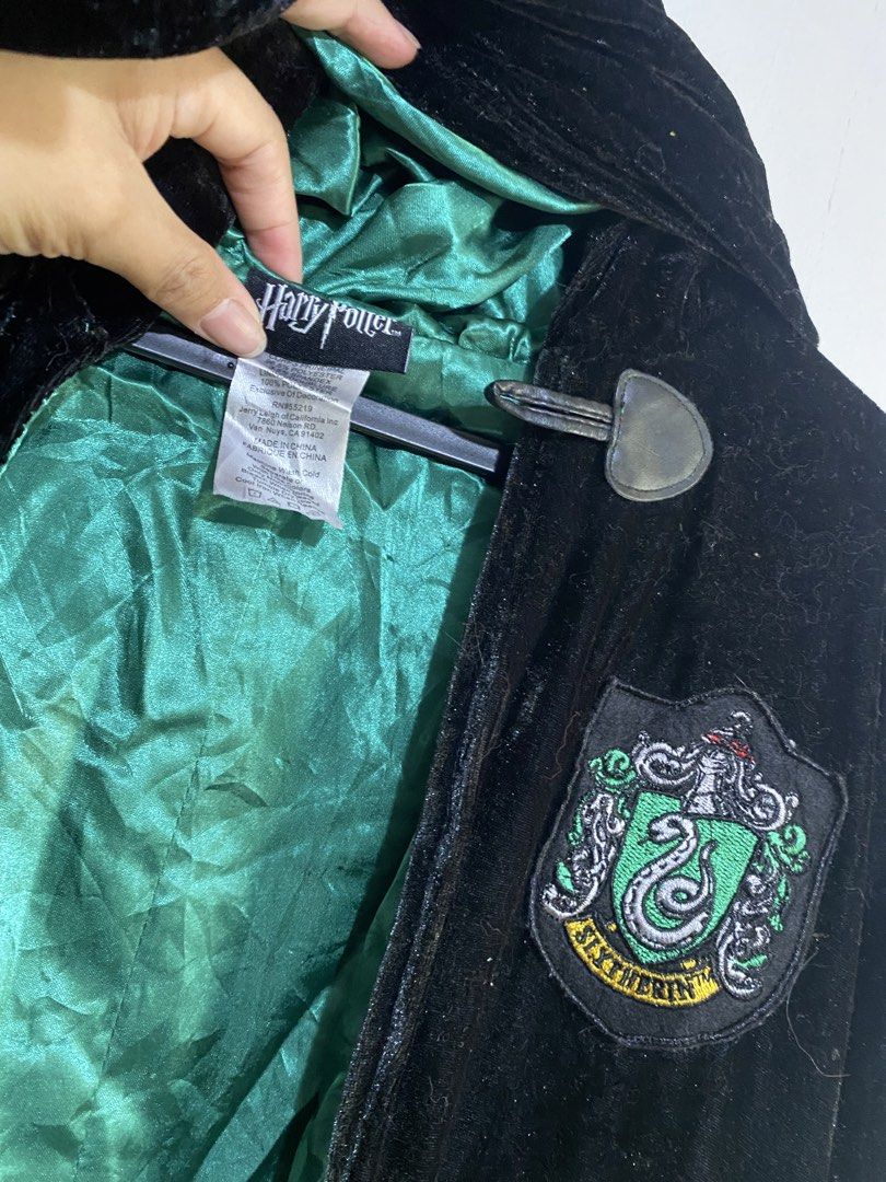 Harry Potter Slytherin Robe (Category: Western Merchandise) located in La Trinidad. Submitted by snowsnow_18 (Listing ID 1462593135, Image 3). Description: SLYTHERIN HARRY POTTER ON TAG ONESIZE VELVET FABIC HIGH QUALITY P1,500.