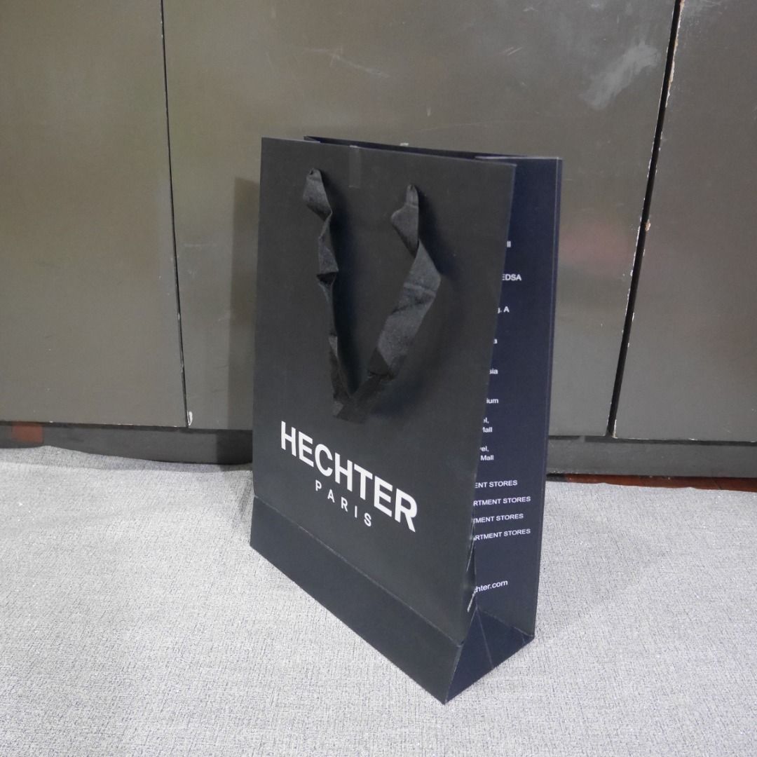 Hechter Black Paper Bag – (Category: Other Stationery & Craft) located in Valenzuela. Submitted by cletini (Listing ID 1462632762, Image 1). Description: Condition Statement (Very Important): • Authentic: Guaranteed 100% original. • Swipe photos for paper bag size • Condition : Please see photos for actual item and condition. • Transparency: I have inspected the bag and taken photos of all noticeable marks, creases, or minor wear (if any). If no 