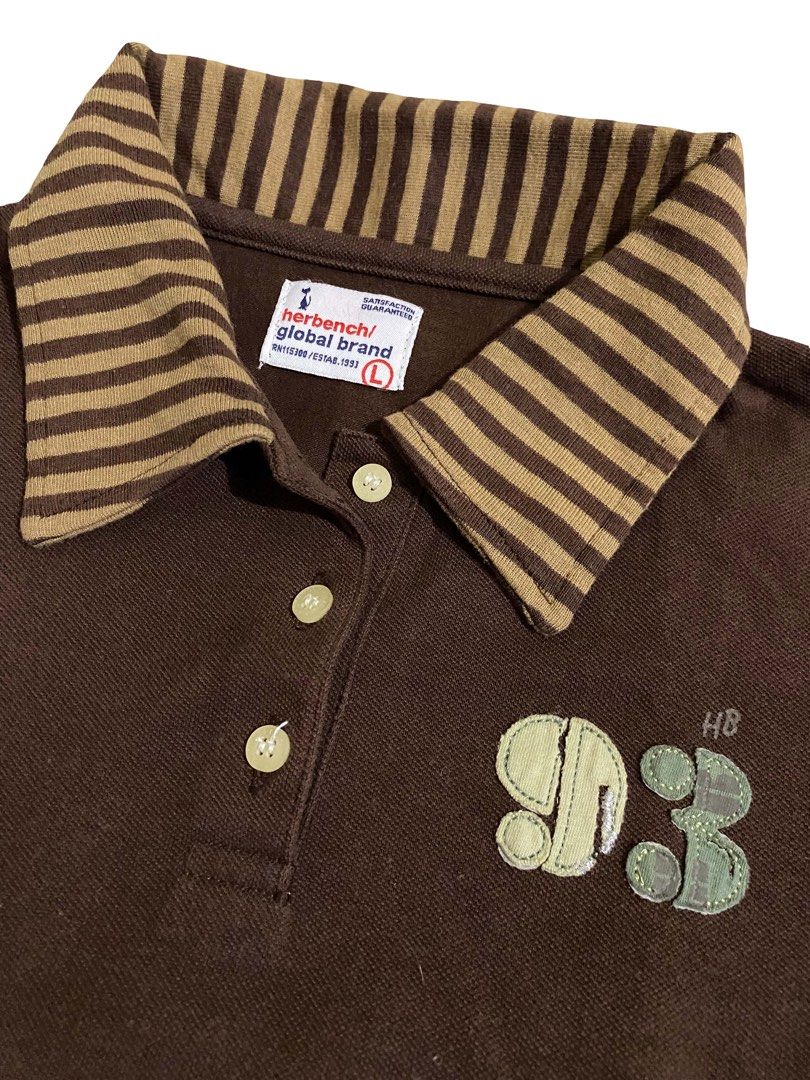 Herbench Brown Long Sleeve Polo Top (Category: Shirts) located in Manila. Submitted by thrift.bell (Listing ID 1462645412, Image 3). Description: Tag Size: Large (L) — Best fits Small to Medium Length: 23 Width: 16.5 Sleeve Length: 22 Color: Brown & Tan Flaws: None Condition: 10 / 10 .