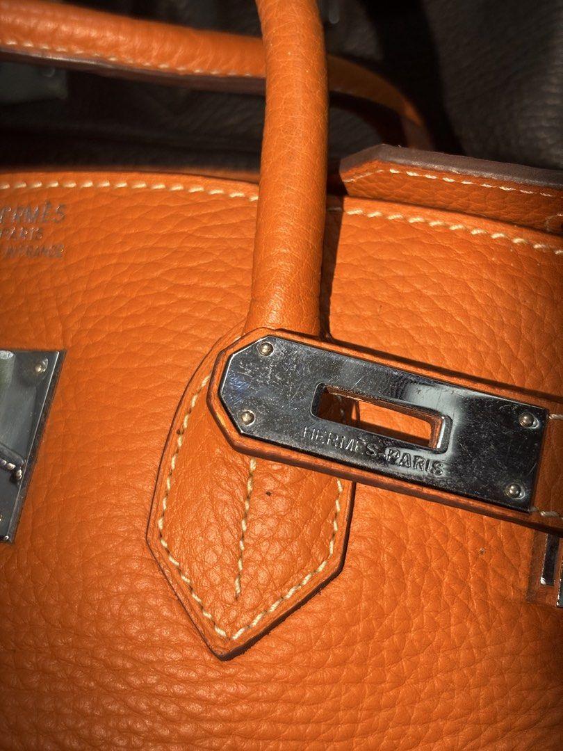 Hermes birkin bag (Category: Luxury Bags & Wallets) located in Manila. Submitted by kingblaize (Listing ID 1462639389, Image 2). Description: It features the signature Birkin silhouette with a foldover flap, dual rolled top leather handles, and a horizontal leather belt strap.