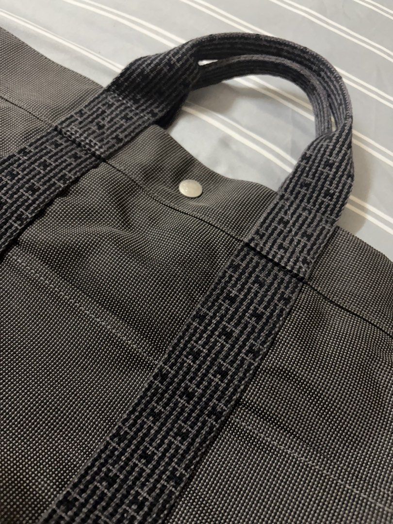 Hermes Herbag Tote Bag Grey Canvas (Category: Luxury Bags & Wallets) located in Quezon City. Submitted by anna12annaf (Listing ID 1462552598, Image 2). Description: - Grey canvas tote bag - Features patterned straps - Secure snap closure - Spacious and practical for everyday use - Durable material - Classic design Fourre Tout Cabas tote.